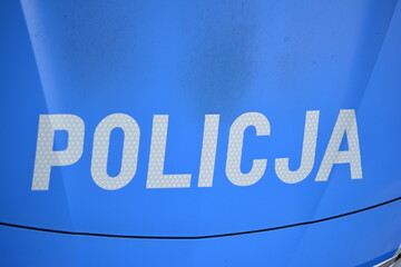 Znak policja na radiowozie polskiej policji. 
