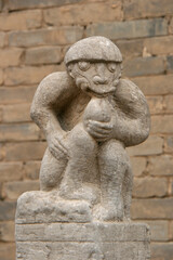 Obraz premium statue of a monkey (?) at the chang family mansion in pingyao in china 