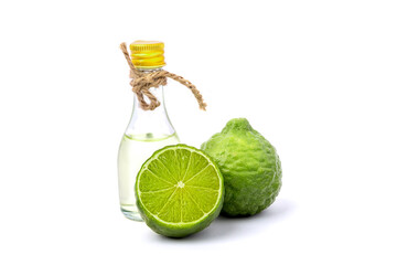 Essential oil extracted from bergamot in a clear bottle with zigzag kaffir lime side.