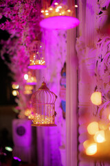 Selective focus shot of illuminated bird cage decoration at a wedding in Mumbai, India
