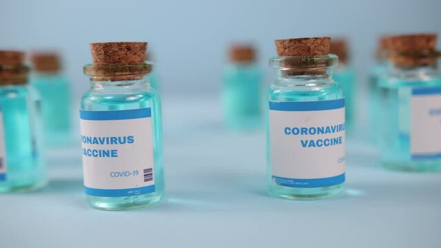 Coronavirus medication. Coronavirus covid-19 vaccine. A glass vial of covid-19