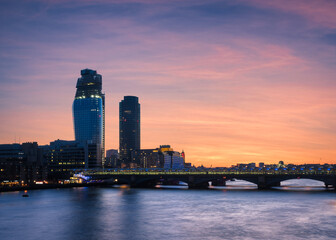 Fototapeta na wymiar London Bridge and skyline at night. View from the Millennium bridge, London