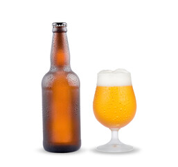 Beer bottle and cold glass with drops isolated on white background.