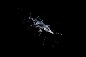 Water splash isolated on black background.