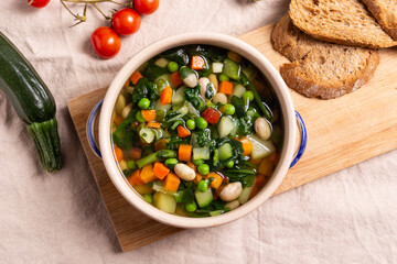 Mixed vegetable soup with bread. Minestrone, ideal for a light lunch or dinner - obrazy, fototapety, plakaty