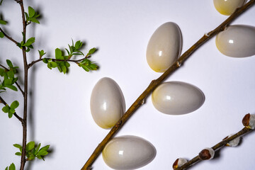 chocolate candies on willow branches in the form of flowering