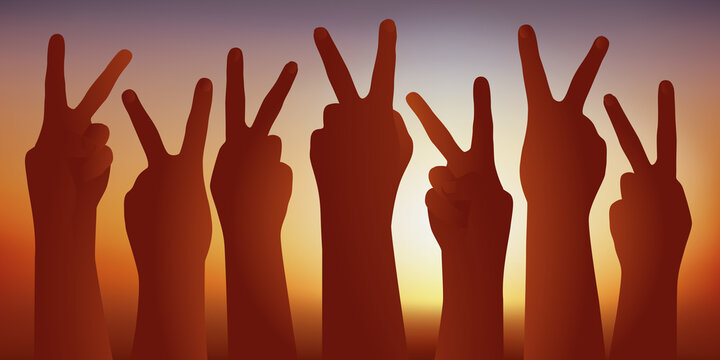 Concept de réussite avec un groupe de personne qui lèvent la main en formant le V de la victoire pour montrer leur triomphe.