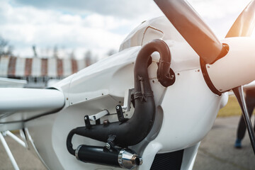 close up of engine and propeller of remote radio controlled light airplane