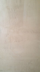 Obraz premium The plastered wall is gray. The wall inside the room. Background picture with scratches. Architecture and construction. Interior design. Copy space for text.