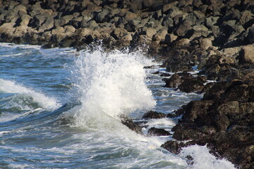 Waves crashing against rocks