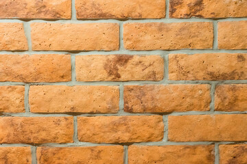 Orange bricks on the wall texture and background