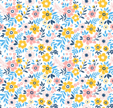 Beautiful vintage floral pattern in small spring flowers. Small colorful flowers. White background. Liberty style print. Floral seamless background. The elegant the template for fashion prints. © ann_and_pen