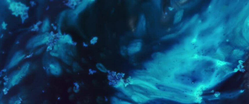 Macro Textures with Vibrant Neon Color Palette. Abstract Background Made with Oil Mixed with Blue and Black Dye, Ink, and Paint.