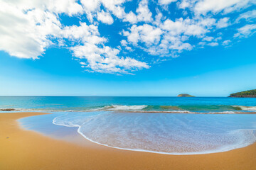Fototapeta premium Turquoise sea and golden sand in beautiful La Perle beach