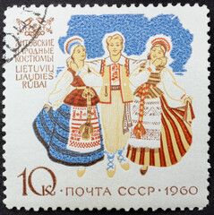 Postage stamp of 'Lithuanian folk costumes' printed in Republic of USSR. Series 'Costumes of the peoples of the USSR' by artist V. Pimenov, 1960