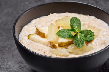 Oat in the black bowl