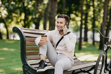 Businessman or manager talk with client during break in park