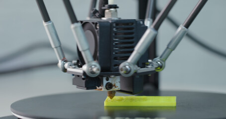 3D Printing Machine printing a piece of plastic