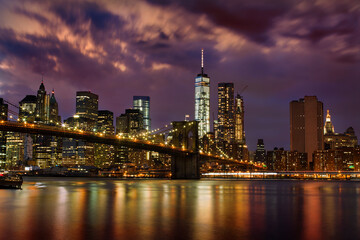 Fototapeta na wymiar Brooklyn Bridge and Financial District, New York, at Night