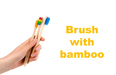 wooden eco friendly bamboo toothbrushes on a white background. Dental care conept