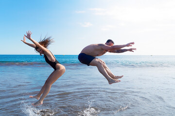 Happy young couple at the sea vacations