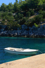 Small boat and beautiful clear sea on island Lastovo, Croatia.