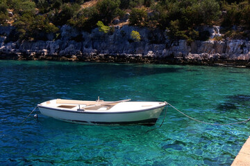 Fototapeta na wymiar Small boat and beautiful clear sea on island Lastovo, Croatia.