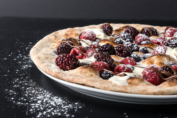 Dark and White Chocolate berry pizza