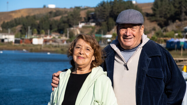 Senior Couple, Latinos, Smiling At Camera, Enjoying A Good Old Age And Good Day