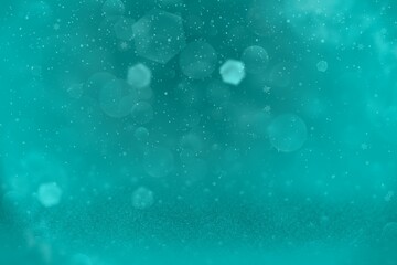 light blue cute glossy glitter lights defocused bokeh abstract background and falling snow flakes fly, celebratory mockup texture with blank space for your content