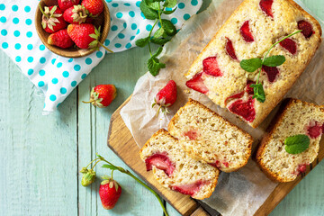 Delicious summer dessert gluten free strawberry pie, cake with strawberries on a wooden table. Top view flat lay background. Free space for your text.