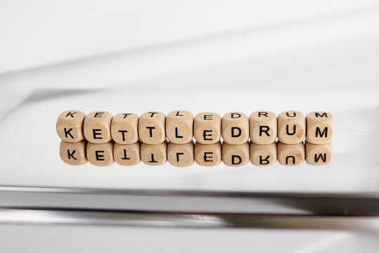 Word kettledrum made by wooden cubes