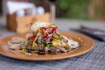 Lunch. Salad and meat. Wine