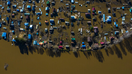 Severe flooding on the river. Sunken suburban areas. Spring flood