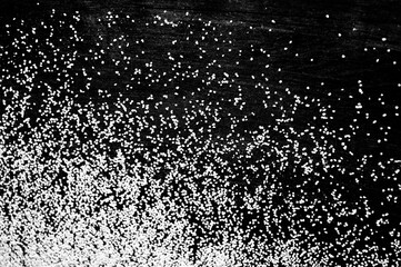 White sand on a black background, texture