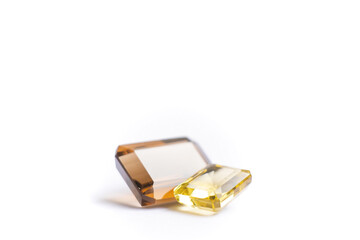 multicolored gemstones on white background close-up