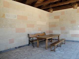 Table and benches in the courtyard of a Georgian temple