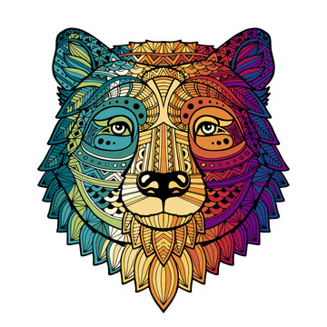 Patterned bear head in the zentangle style of a white background with rainbow gradient passing from green to purple. Tribal ornament painted by hand. Series ethnic animals. African, Indian. Vector.