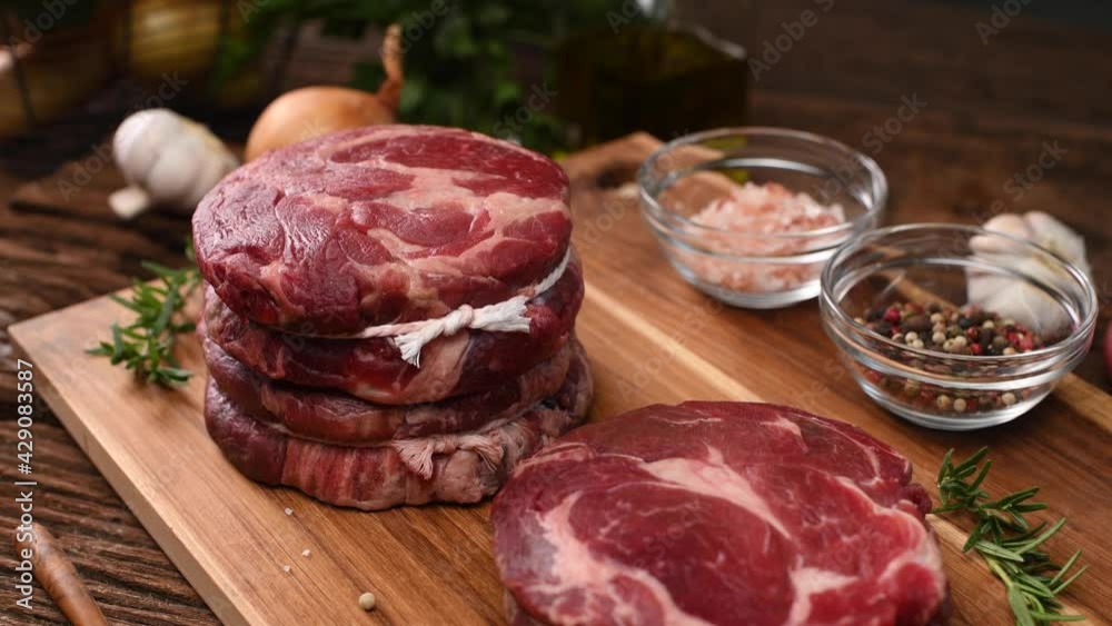 Canvas Prints Fresh raw beef meat on a cutting board