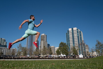 Fototapeta na wymiar Man runner jogger running in the city.