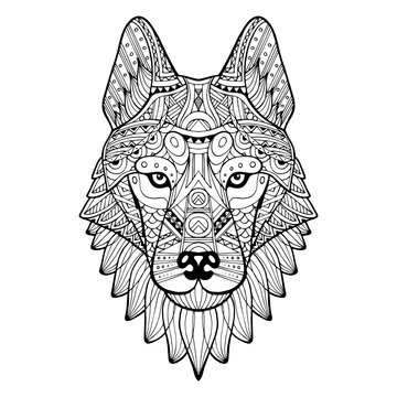 Patterned head of a wolf, husky, dog monochrome. Abstract ethnic image of the head of a wolf with tribal ornament. The ornament is painted by hand. A series of animals in the ethnic style. Vector
