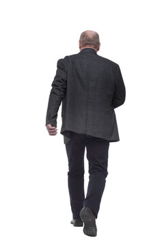 business man walking away. isolated on a white