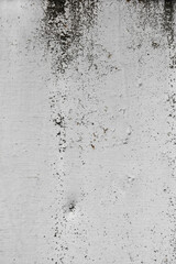 Shabby old paint background. Vintage ancient background. Gray tint of textured old wall. Cracked paint