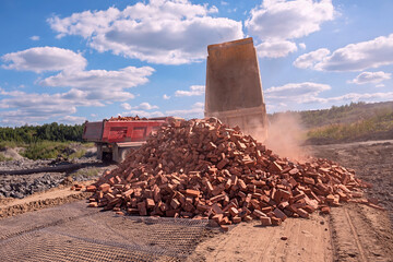 construction of a temporary road at a construction site using bricks as an inert material