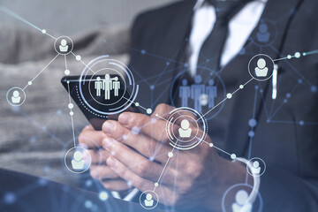 Hands of hr specialist browsing social networks in the Internet in smart phone to find the best candidates to hire international team. Concept of success. Media hologram icons. Formal wear.