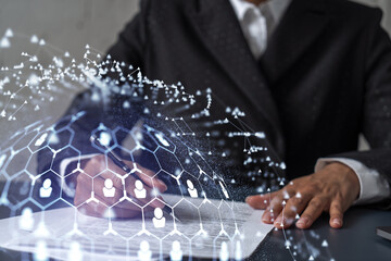 African American businesswoman signing the contract to boost her career and gain new opportunities in personal growth. Hiring new talented crew. Social media hologram icons. Women in business concept