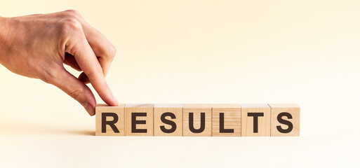 woman made word results with wood blocks