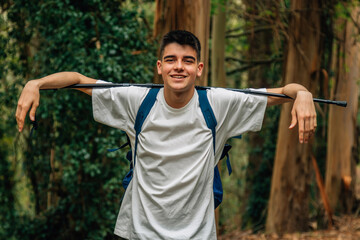 boy with backpack hiking or pilgrimage