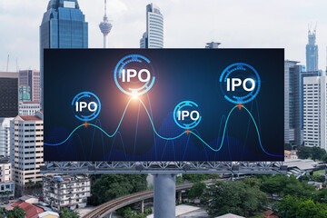 IPO icon hologram on road billboard over day time panorama city view of Kuala Lumpur. KL is the hub...