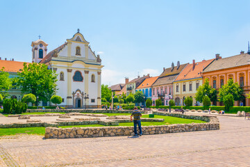 the Marcius 15 square in the hungarian city Vac dominated by the feherek church